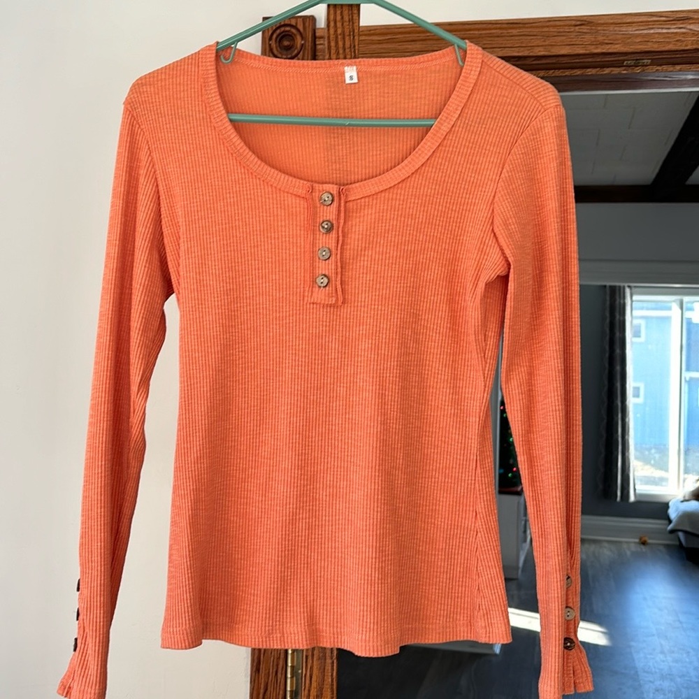 Long sleeved orange shirt with buttons - size small